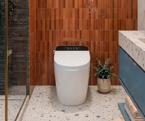 wc japonais dans une salle de bain couleur bleu et marron de la gamme essentielle