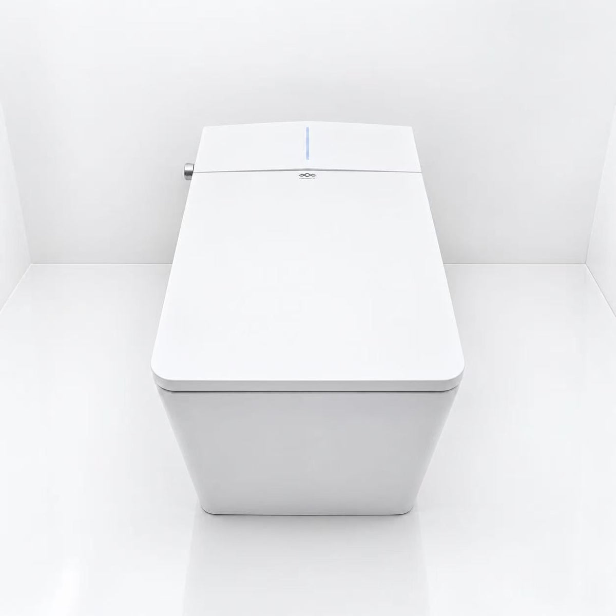 WC japonais Nelsmann KAKU blanc vu du dessus, abattant fermé, logo Nelsmann et témoin lumineux bleu