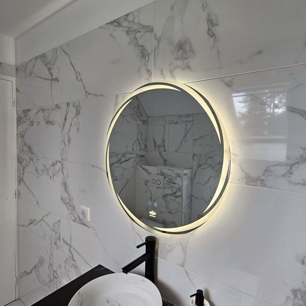 Miroir rond lumineux Nelsmann Aura en lumière chaude au-dessus d'un lavabo