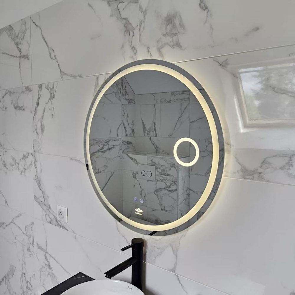 Miroir LED rond Nelsmann Elys en lumière neutre au-dessus d'une vasque à poser