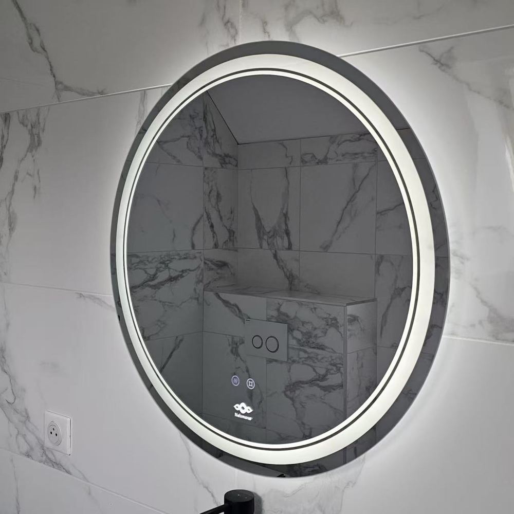 Miroir rond lumineux Nelsmann Nova en lumière blanche froide sur mur en marbre