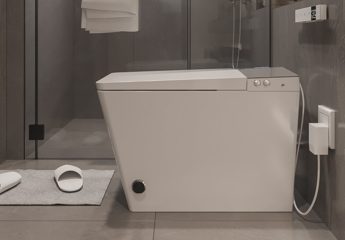 Toilette Japonaise Nelsmann Gris vue de côté avec capteur au pied et prise 220V